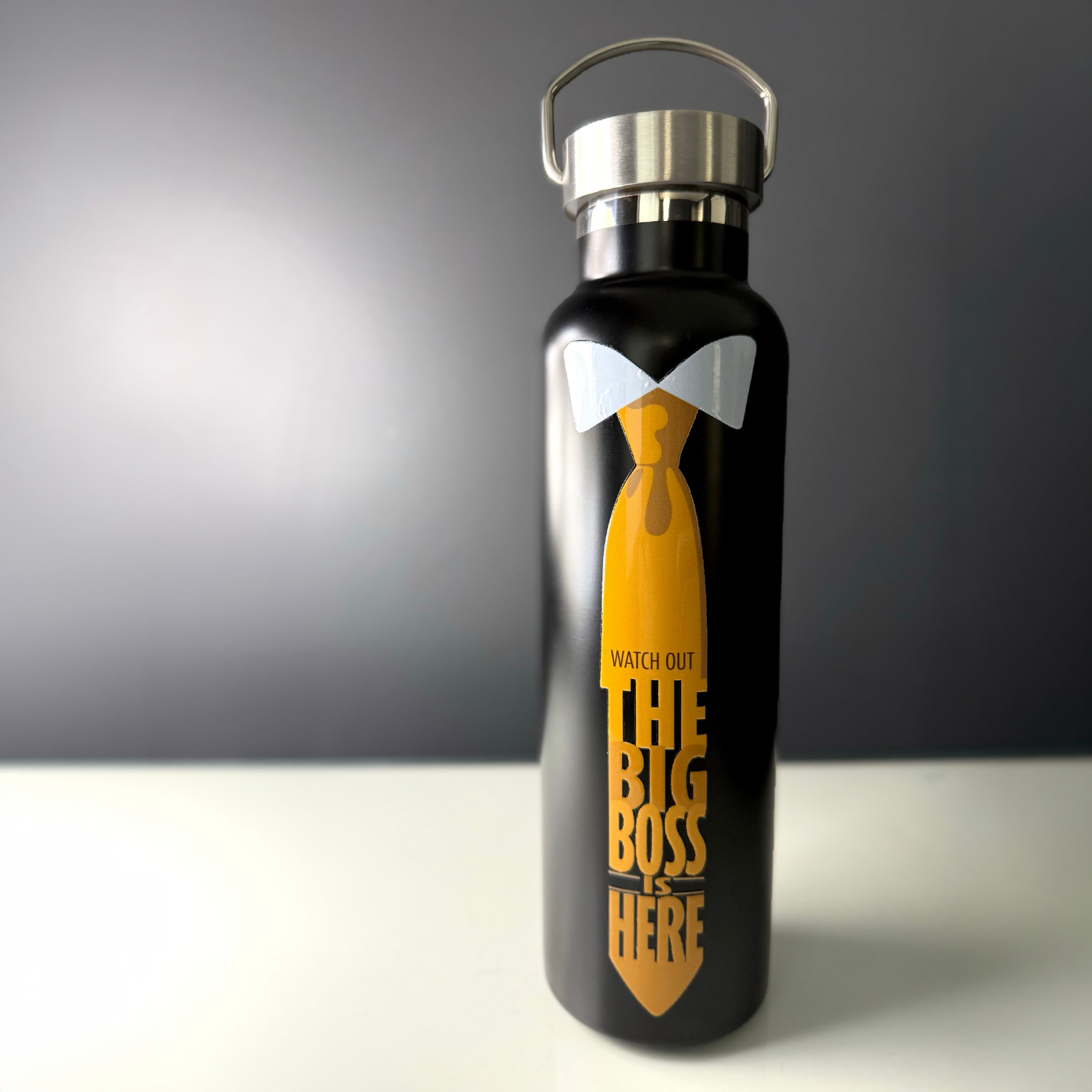 A 20oz aluminum black water bottle with the words "Watch Out The Big Boss Is Here"