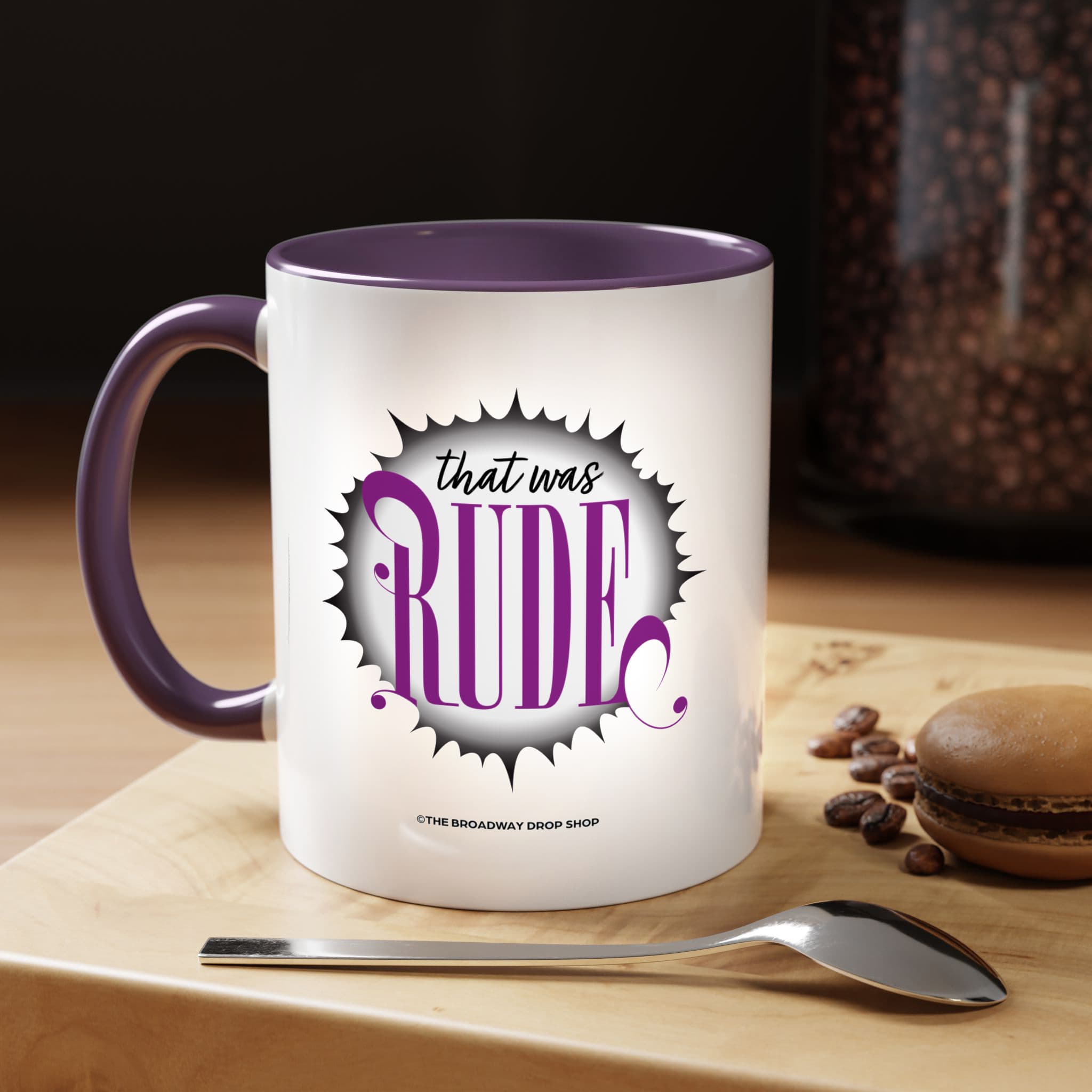 A white mug with That. Was. Rude. printed on the side